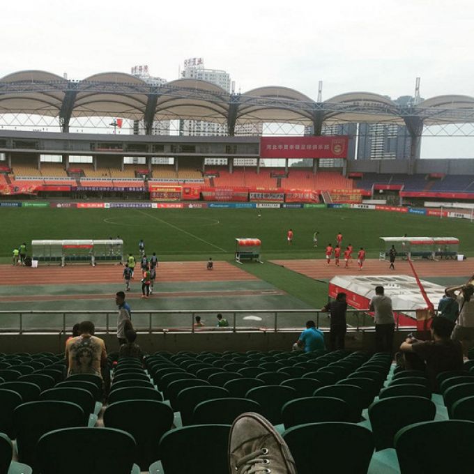 Стадион олимпийского спорткомплекса города Циньхуандао. Ухань Спортс центр Стэдиум. Nanchang International Sports Center Stadium. Где играет какой стадионе